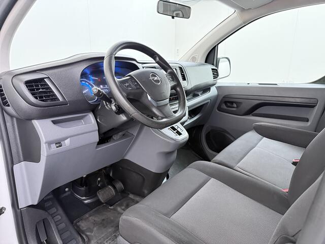 Opel VIVARO E L2H1 9-Persoons SOH 99% 50kWh Trekhaak Navi Airco Apple Carplay Android Auto Pdc Cruise Control Led Schuifdeur Isofix Bluetooth Dealeronderhouden 1e Eigenaar Origineel Nederlandse Bus
