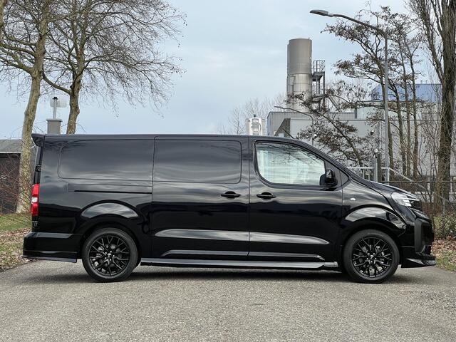 Opel VIVARO Electric L3 75 kWh 136pk | 8 jaar garantie | STX SPORT | Lederen bekleding STX | STX Pakket | Dakspoiler | Sideskirts | 18 inch zwarte velgen | City Pakket | Comfort Pakket | Exterieur Pakket | Full ECO LED verlichting | Winter Pakket | Houten afwerking l