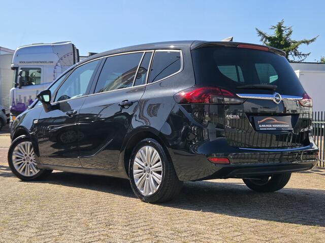 Opel ZAFIRA Tourer 1.4 Cosmo 7-persoons 140pk NAVIGATIE|CAMERA|CRUISE CONTROL|PDC VOOR&ACHTER|AIRCO|GETINT GLAS|BLUE TOOTH|17 INCH Maandag tot Vrijdag geopend van 09.00 tot 20.00 uur en Zaterdag van 09.00 tot 18.00 uur