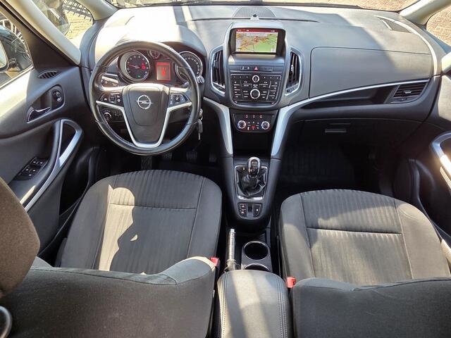 Opel ZAFIRA Tourer 1.4 Cosmo 7-persoons 140pk NAVIGATIE|CAMERA|CRUISE CONTROL|PDC VOOR&ACHTER|AIRCO|GETINT GLAS|BLUE TOOTH|17 INCH Maandag tot Vrijdag geopend van 09.00 tot 20.00 uur en Zaterdag van 09.00 tot 18.00 uur