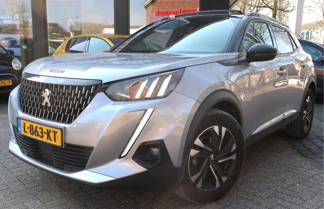Peugeot 2008 130 Pk Benzine Superluxe * GT * Automaat * Open Schuif Kanteldak * Navigatie * ook Apple Car Play en Android Auto * 1/2 Lederen Interieur * Stoelverwarming * GT * Keyless Entree & Start Button * Dodehoekbewaking * Vingerhoets; Vierde Generatie Eersteklas 