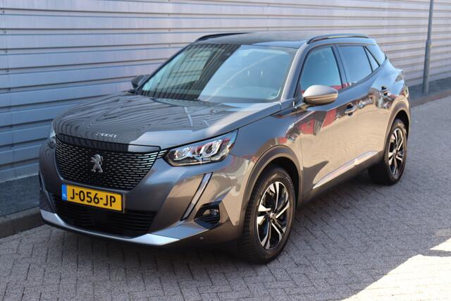 Peugeot 2008 1.2 PureTech Blue Lease Allure O.a: PDC, Camera, Leder, Pano, Trekhaak, Stoelverw, Etc. All-in prijs!