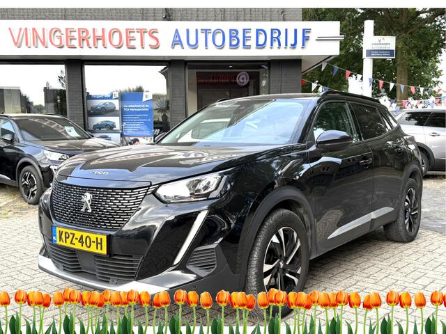 Peugeot 2008 130 Pk Automaat Benzine * Navigatie * Voor en Achter Parkeersensoren + Camera Achterzijde ! * Climate & Cruise Control * Keyless Start * Parfumeur * Vingerhoets; Vierde Generatie Eersteklas Service. Al meer dan 100 jaar een begrip in de Brabantse Kempen