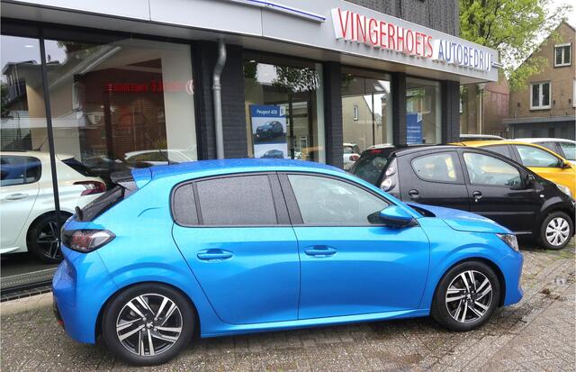 Peugeot 208 100 Pk Benzine * Luxe Allure * * Navigatie * Climate & Cruise Control * Achteruitrij Parkeer Camera * L.M. Velgen * 1/2 Leder Interieur * Keyless Start Button * Apple Car Play & Android Auto * Stoelverwarming * DAB Radio * Vingerhoets; Vierde Generatie Ee