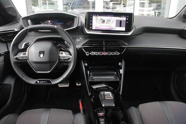 Peugeot 208 1.2 Hybrid 145PK AUTOMAAT GT | NAVIGATIE | DRAADLOZE APPLE CARPLAY/ANDROID AUTO | CAMERA VOOR + ACHTER | FULL LED KOPLAMPEN | LICHTMETALEN VELGEN 17" | DODEHOEK DETECTIE | DRAADLOZE TELEFOONLADER | KEYLESS ENTRY/START | DAB+ RADIO | ADAPTIVE CRUISE CONTRO
