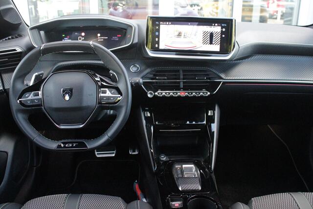 Peugeot 208 1.2 Hybrid 145PK AUTOMAAT GT | NAVIGATIE | DRAADLOZE APPLE CARPLAY/ANDROID AUTO | CAMERA VOOR + ACHTER | FULL LED KOPLAMPEN | LICHTMETALEN VELGEN 17" | DODEHOEK DETECTIE | DRAADLOZE TELEFOONLADER | KEYLESS ENTRY/START | DAB+ RADIO | ADAPTIVE CRUISE CONTRO
