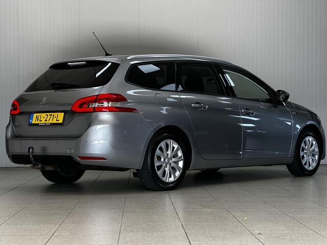 Peugeot 308 SW 1.2 PureTech Style/ D-Riem verv: 116.000 KM!/ Trekhaak/ 16'' LMV/ Panorama-Dak!/ DAB+/ Navi/ Clima/ Cruise/ Elek. pakket/ Isofix/ Bluetooth/ Multi. LEDER. Stuur/ Mistl./ PDC/ Extra getint glas.