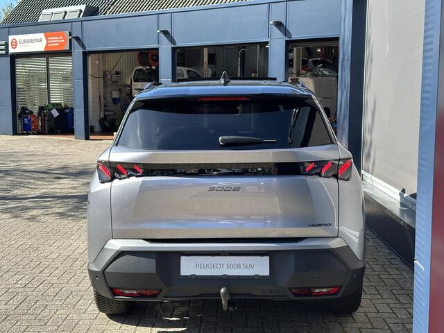 Peugeot 5008 1.2 Hybrid 145 GT | Zeer complete Demo van 2025 !| Glazen Panorama Schuif-/Kanteldak | Navigatie | 360 Graden Camera | Trekhaak 1000 KG | 7 Zitplaatsen | Adaptieve Cruise Control | 3-Zone Climate Control | Full LED Verlichting | All Season Banden | Keyles