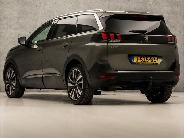 Peugeot 5008 1.2 PureTech Deluxe 7 Persoons Automaat (PANORAMADAK, APPLE CARPLAY, MEMORY SEATS, LEDER, STOELVERWARMING, 360 CAMERA, SPORTSTOELEN, LED KOPLAMPEN, GETINT GLAS, TREKHAAK, NIEUWSTAAT)