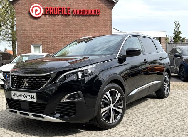 Peugeot 5008 130 Pk Benzine 5-Persoons Luxe Allure Zwart * Trekhaak * Navigatie * 1/2 Lederen Interieur * L.M. Velgen * Climate & Cruise Control * Hoge Zit * Vingerhoets; Vierde Generatie Eersteklas Service. Al meer dan 100 jaar een begrip in de Brabantse Kempen.