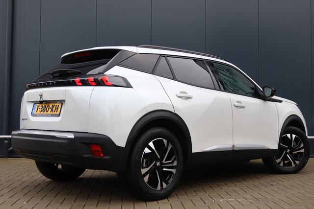 Peugeot e-2008 EV Allure Pack 50 kWh | Nieuwstaat! | 3D I-cockpit | Half Leder | Adaptieve Cruise | Camera | Lichtmetaal | Apple Carplay / Android Auto
