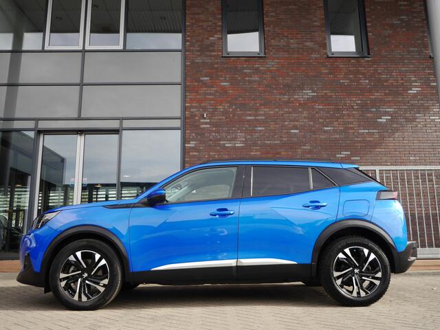 Peugeot e-2008 EV Allure 50 kWh | 3 Fase | Adaptieve cruise control | Draadloze telefoonlader | Stoelverwarming | Navigatie | Achteruitrijcamera | Lichtmetalen velgen | Apple carplay/Android auto