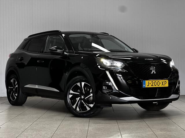 Peugeot e-2008 EV Allure 50 kWh/ Virtual Cockpit/ 17'' LMV/ Camera/ Keyless/ Apple + Android/ Voorruitverw./ LED Koplampen/ PDC V+A/ Navi/ Clima/ Cruise/ Bluetooth/ Multi. LEDER. Stuur.