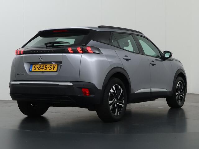 Peugeot e-2008 EV Allure 50 kWh | SOH 91% | Digitaal Dashboard | Navigatie | Apple CarPlay/Android Auto | Camera | DAB | Stoelverwarming | Adaptieve Cruise Control | 3-Fase |