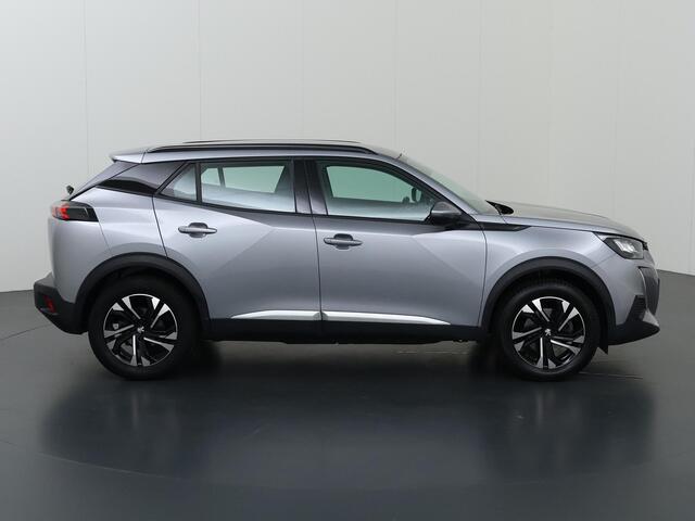 Peugeot e-2008 EV Allure 50 kWh | SOH 91% | Digitaal Dashboard | Navigatie | Apple CarPlay/Android Auto | Camera | DAB | Stoelverwarming | Adaptieve Cruise Control | 3-Fase |