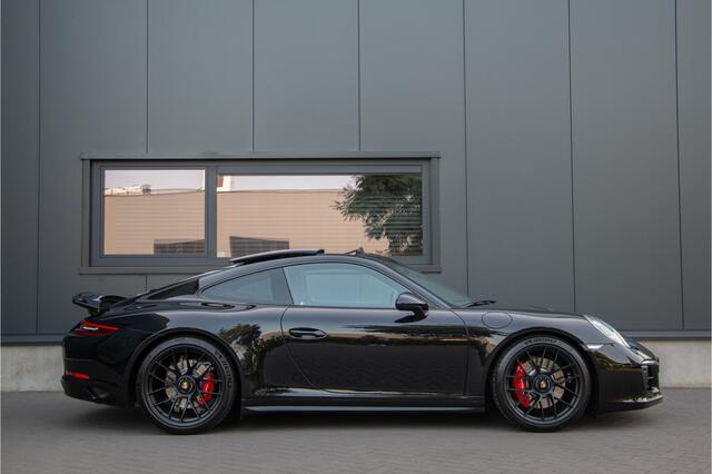 Porsche 911 3.0 Carrera GTS 450PK | Pano | Sportuitlaat | PADM | 18 weg Sportstoelen | Bose | Alcantara | Stuurverwarming | Sport Chrono | Cruise Control | Camera | Sport Design | 20" | N.P ¤235.387 | Target Blu Eye | 991.2 | PTV Plus | Carbon | Dealer onderhouden.