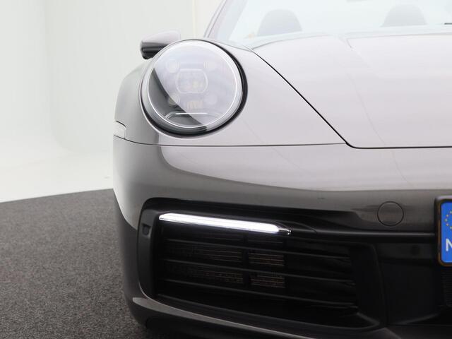 Porsche 911 Cabrio 3.0 Carrera 385 Pk Automaat | 360 Camera | Sportuitlaat | 20 Inch | Bose Audio | Carplay | LED | Parkeersensoren | Cruise Control | 57.285 Km!
