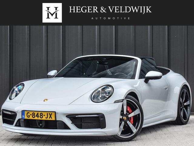 Porsche 911 Cabrio 3.0 Carrera 4 S NL-Auto 451pk | Sport design pack | Achteras besturing | Lift systeem | Sport chrono | 18-wegs memory seats | Burmester sound | Adaptive cruise | Carbon pack | Matrix led | 360 camera | Nw prijs 236.000