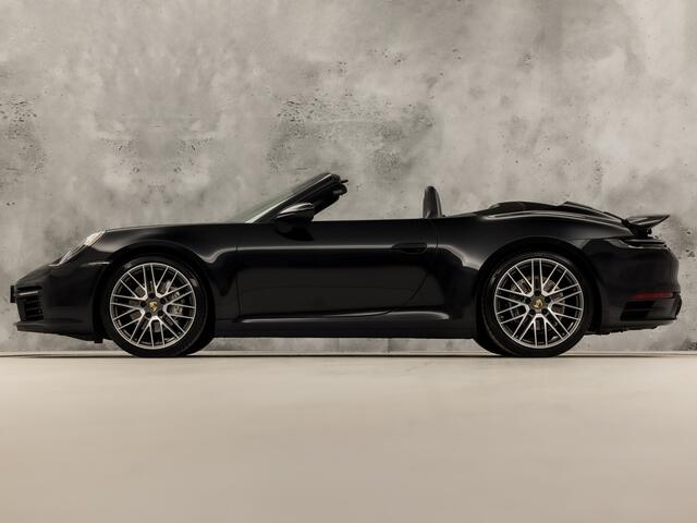 Porsche 911 Cabrio 3.0 Carrera 385Pk (SPORT CHRONO PAKKET, SPORTUITLAAT, BOSE AUDIO, LED MATRIX, APPLE CARPLAY, CAMERA, SFEERVERLICHTING, STOELVERWARMING, NIEUWSTAAT)