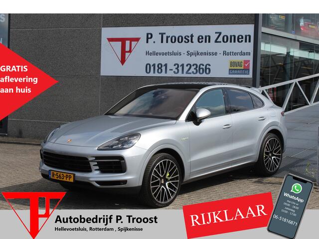 Porsche CAYENNE Coupé 3.0 E-Hybrid Automaat/Panoramadak/Navigatie/Apple carplay/Climate control/Cruise control adaptief/Elektrische achterklep/Achteruitrijcamera/Trekhaak elektrisch/Lederen bekleding/Elektrisch bedienbare voorstoelen/Voorstoelen en achterbank verwarmd/Li