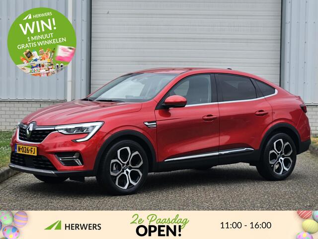 Renault Arkana 1.6 E-Tech Hybrid 145 Intens / 1e Eigenaar / Dealer Onderhouden / Leren bekleding / Elektrische Stoelen voor / Stoelverwarming + stuur / Adaptieve Cruise Control / Achteruitrijcamera / Android Auto / Apple Carplay /