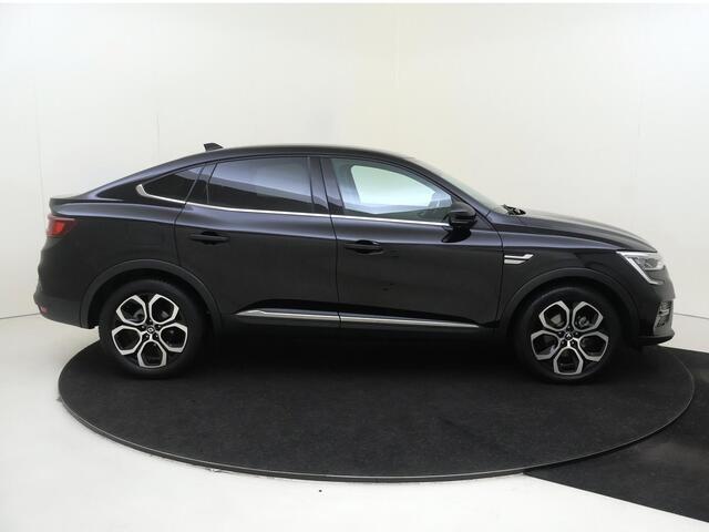 Renault Arkana 1.6 E-Tech Hybrid 145 PK | Apple Carplay/Android | cruise control adaptief | dodehoek detectie | electronic climate control | LED koplampen | lederen bekleding | lichtmetalen velgen 18" | navigatiesysteem | voorstoelen verwarmd |