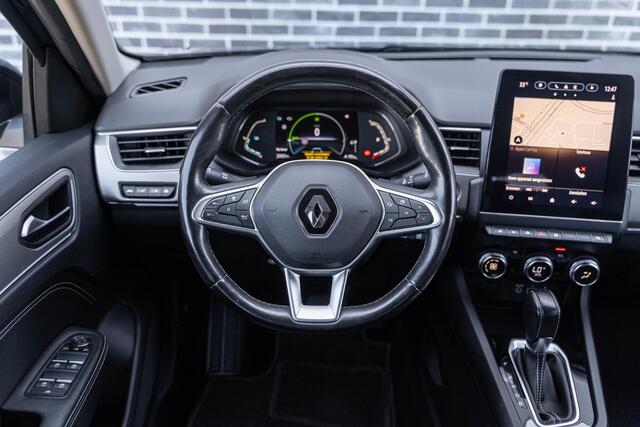 Renault Arkana 1.6 E-Tech Hybrid 145 Intens | Trekhaak | Lederen Bekleding | Stoelverwarming | Elektrisch Verstelbare Voorstoelen | Achteruitrijcamera | Parkeersensoren | LED Koplampen | Keyless Entry | Navigatie Groot Scherm | Apple Carplay | Android Auto