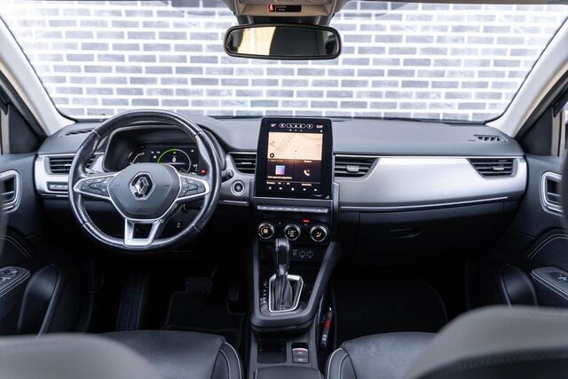 Renault Arkana 1.6 E-Tech Hybrid 145 Intens | Trekhaak | Lederen Bekleding | Stoelverwarming | Elektrisch Verstelbare Voorstoelen | Achteruitrijcamera | Parkeersensoren | LED Koplampen | Keyless Entry | Navigatie Groot Scherm | Apple Carplay | Android Auto