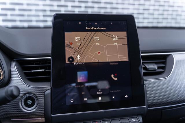 Renault Arkana 1.6 E-Tech Hybrid 145 Intens | Trekhaak | Lederen Bekleding | Stoelverwarming | Elektrisch Verstelbare Voorstoelen | Achteruitrijcamera | Parkeersensoren | LED Koplampen | Keyless Entry | Navigatie Groot Scherm | Apple Carplay | Android Auto