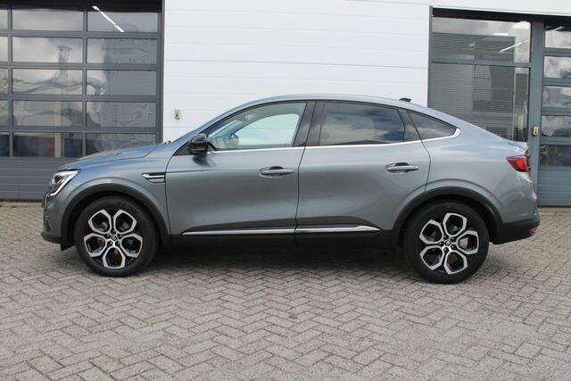Renault Arkana 1.6 E-Tech Hybrid 145 PK Intens | Elektrisch bedienbare trekhaak | Camera achter | Bose geluid | Groot scherm | Reservewiel | Dode hoek sensoren | Adaptieve cruise controle |