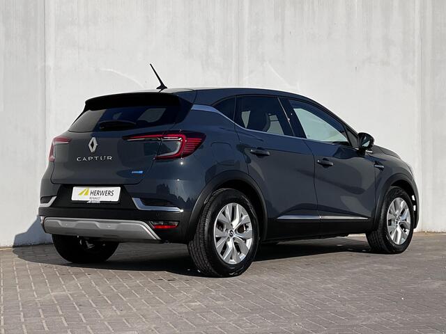 Renault CAPTUR 1.6 E-Tech Hybrid 145 Intens / Dealer onderhouden / Achteruitrijcamera / Parkeersensoren V+A / Navigatie via Apple Carplay Android / Climate Control / DAB /