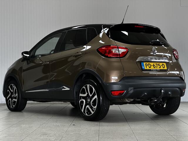 Renault CAPTUR 1.2 TCe Dynamique/ AUTOMAAT!/ Trekhaak/ 17'' LMV/ Keyless/ Navi/ Clima/ Cruise/ Elek. pakket/ Isofix/ Bluetooth/ Armsteun/ Multi. LEDER. Stuur/ Mistl./ Chroom/ PDC/ Extra getint glas.