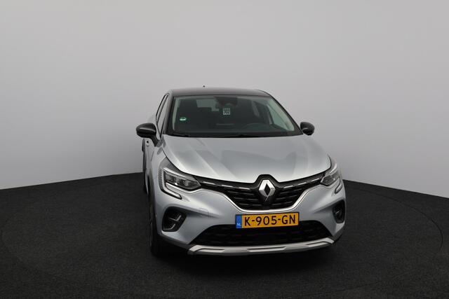 Renault CAPTUR 1.6 E-Tech Plug-in Hybrid 160 Intens/ Automaat!/ Trekhaak/ LED Koplampen/ 360 Cam/ Virtual Cockpit/ Dodehoekdetc./ 17''LMV/ Keyless/ Apple+android/ DAB+/ Half-LEDER/ Clima/ Navi/ Cruise/ Bluetooth/ Multi.LEDER.Stuur/ PDC V+A.