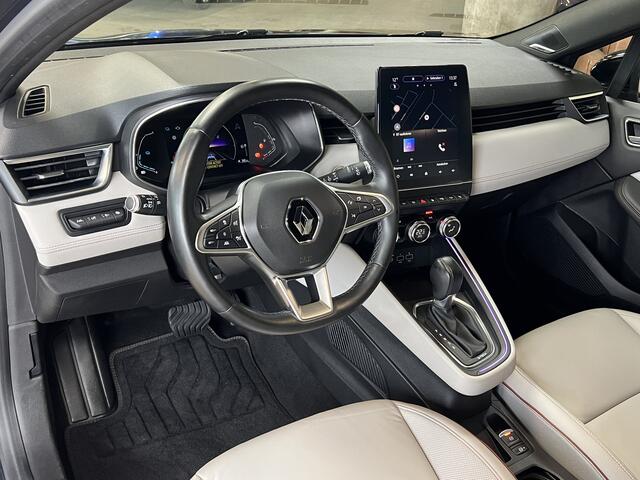 Renault CLIO 1.6 E-Tech Hybrid 140 Initiale Paris | Groot Navi | Bose | 360 | PDC V+A | Stoel & stuurverwarming | 17" | 100% Dealer onderhouden!