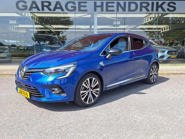 Renault CLIO 1.6 E-Tech Hybrid 140 Initiale Paris | HEV | Leder | Blindspot | 360 Cam | stuur/stoel verwarming |