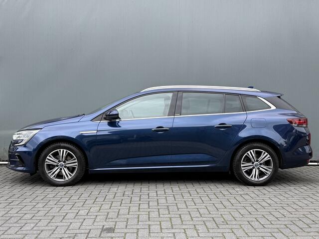 Renault MEGANE Estate BWJ 2021 1.6 E-Tech Plug-In 122 PK Hybrid 160 Intens TREKHAAK | FULL LED | BOSE | HEAD-UP DISPLAY | KEYLESS | STOELVERW. + STUURVERW. | HALF LEDER | CAMERA | CARPLAY + ANDROID | NAVI | CLIMA | CRUISE | LMV | PDC