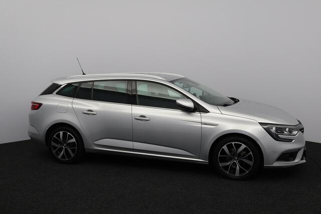 Renault MEGANE Estate 1.3 TCe Bose/ Automaat/ Trekhaak/ 17'' LMV/ Apple + Android/ Dode-Hoek DET./ Half-Leder/ Lane-Assist./ Camera/ Keyless/ PDC V+a/ Extra getint glas/ DAB+/ Dakrails.
