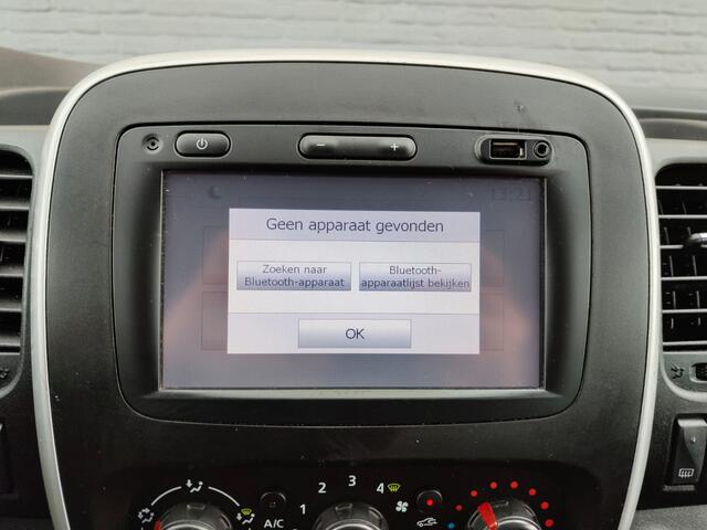 Renault TRAFIC 1.6 dCi 126PK T29 L2H1 3-Persoons Euro 6 Trekhaak Airco Navi Cruise Control Bluetooth Pdc Comfort Energy Betonplex vloer Wandbetimmering Schuifdeur Achterdeuren Origineel Nederlandse Auto