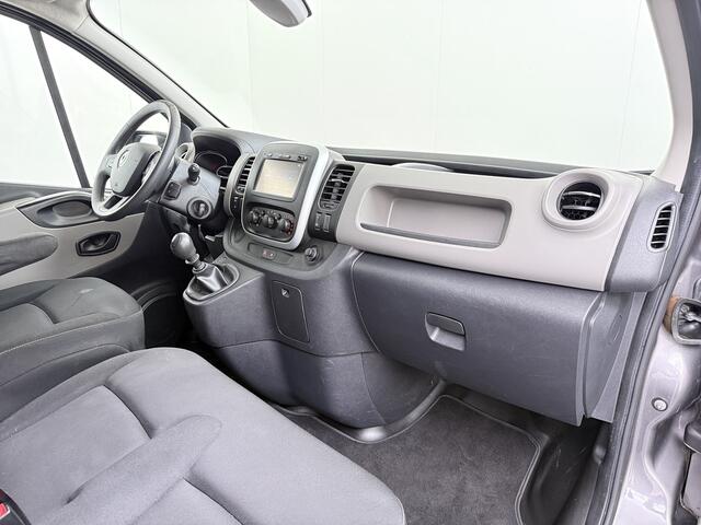 Renault TRAFIC 1.6dCi T29 L2H1 3-Persoons Trekhaak Euro 6 Navi Airco Cruise Control Bluetooth Pdc Comfort Regen-Lichtsensor Betonplex Vloer Lat om Lat Wandbetimmering Schuifdeur 2.000KG Trekgewicht Origineel Nederlandse Auto
