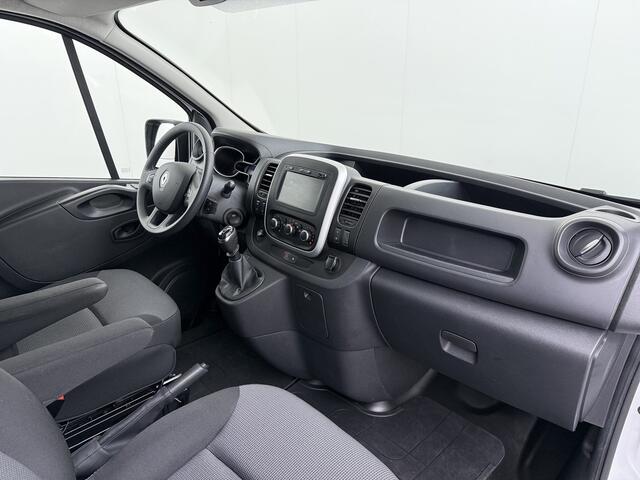 Renault TRAFIC 2.0dCi 120PK T29 L1H1 Trekhaak Airco Navi Euro 6 Cruise Control Bluetooth Pdc Betonplex Vloer Wandbetimmering Schuifdeur 2.000KG Trekgewicht 1e Eigenaar Origineel Nederlandse Auto