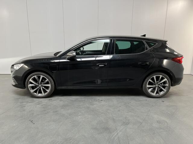 Seat LEON 1.4 TSI eHybrid PHEV FR / AUTOMAAT/ STUUR+STOELVERWARMING/ PARKEER SENSOREN/ MEMORY SEAT/ CRUISE CONTROL/ RIJ-MODI/ DIGITAL DASH/ NAVI/ DAB/ CLIMA/ LED/ 18'' LMV