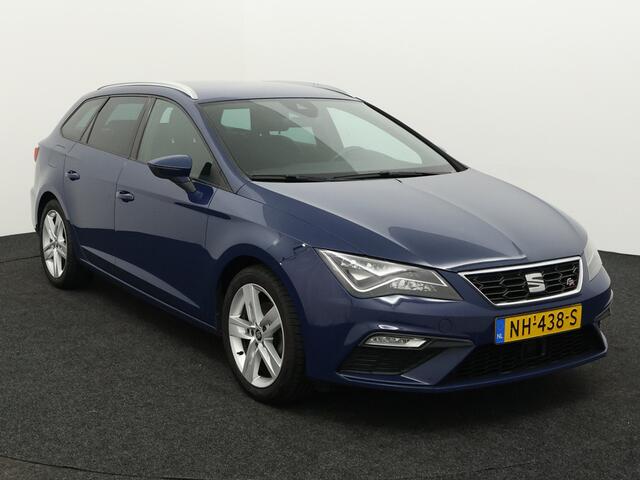 Seat LEON ST 150 PK 1.4 EcoTSI FR Bluetooth, Cruise control adaptief, stuur multifunctioneel, voorstoelen verwarmd, schakelpaddles, De SEAT Leon ST 1.4 EcoTSI FR is een luxe, ruime en sportieve stationwagen die comfort en prestaties perfect combineert. Dankzij de c