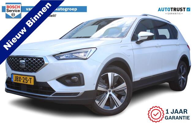 Seat Tarraco 1.4 TSI e-Hybrid PHEV Xperience Business Intense | 245 Pk | Incl. 12 maanden Garantie | Elektrisch wegklapbare trekhaak | Stoelverwarming voor & achter | Stuurwielverwarming | Achteruitrijcamera | Adaptive cruise controle | Elektrische kofferbakklep | Dod