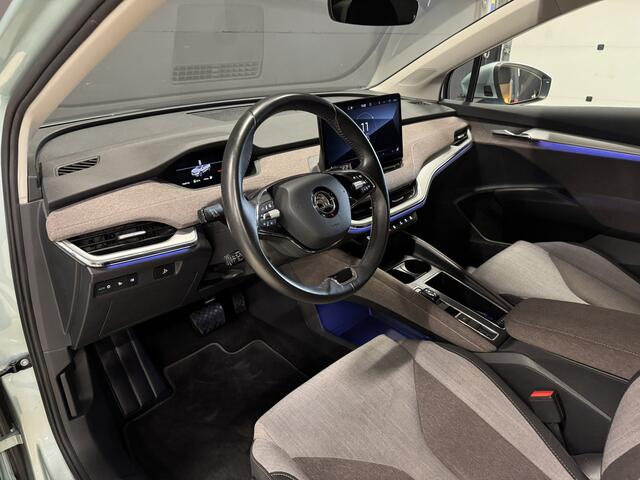 Skoda Enyaq iV 60 First Edition | Camera | Elektr. stoel + geheugen | Adaptive cruise | Carplay | Stoelverwarming