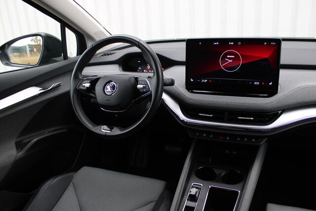 Skoda Enyaq iV 60 | Incl. 12 maanden garantie | Adaptive cruise | Climate control | Apple CarPlay | Stoel en stuurverwarming | Navigatie | Getint glas | LED koplampen | Achteruitrij camera | Draadloos telefoon lader |