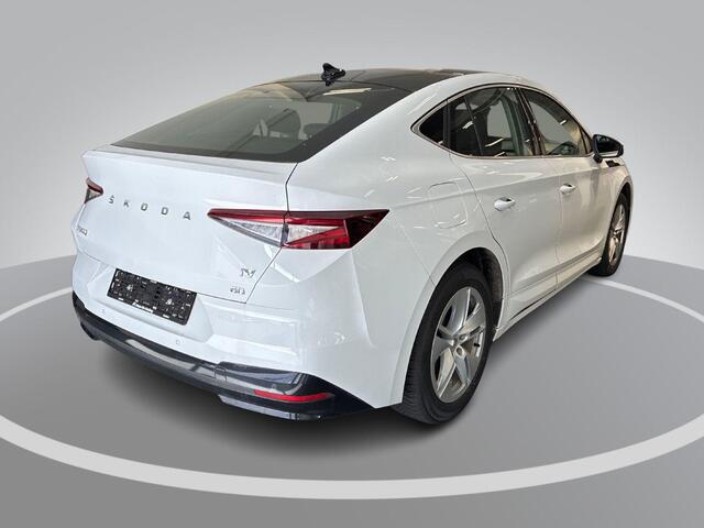 Skoda Enyaq iV Coupé 60 180pk · SOH 94,1% · Panoramadak · Camera · Apple/Android Car Play · 19"Velgen · Sfeerverlichting · Elek. Inklapbare Spiegels ·