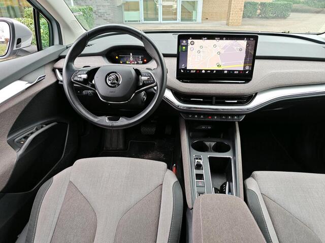Skoda Enyaq iV 60 First Edition / SOH 92%/ AUTOMAAT/ PARK.SENSOREN V+A/ CAMERA/ MEMORY SEAT/ STOELVERWARMING/ CRUISE/ DIGITAL DASH/ KEYLESS/ NAVI/ CLIMA