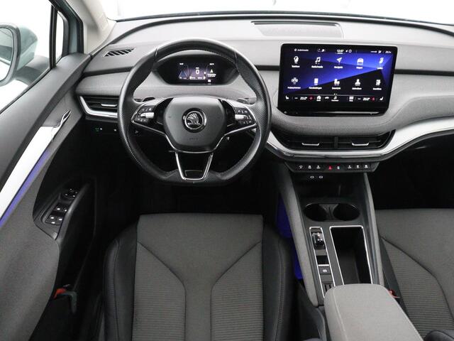 Skoda Enyaq iV 60 | SOH 92.1% | Trekhaak | Stuur/stoel verwarming | Half Leder | Cruise control | Camera | Carplay | Standkachel | Sfeerverlichting | 21''