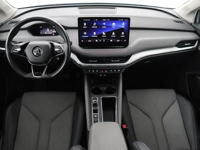 Skoda Enyaq iV 60 | SOH 92.1% | Trekhaak | Stuur/stoel verwarming | Half Leder | Cruise control | Camera | Carplay | Standkachel | Sfeerverlichting | 21''