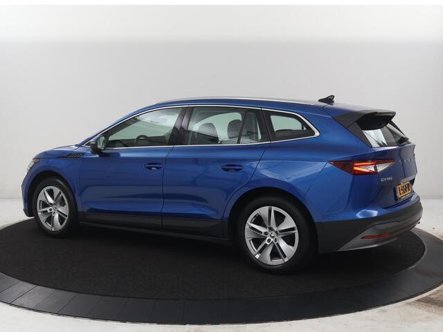 Skoda Enyaq iV 60 | SOH 90,7% | Leder | Stoelverwarming | Head-up | Climate control | Navigatie | Carplay | Sfeerverlichting | Camera | Park assist | EV